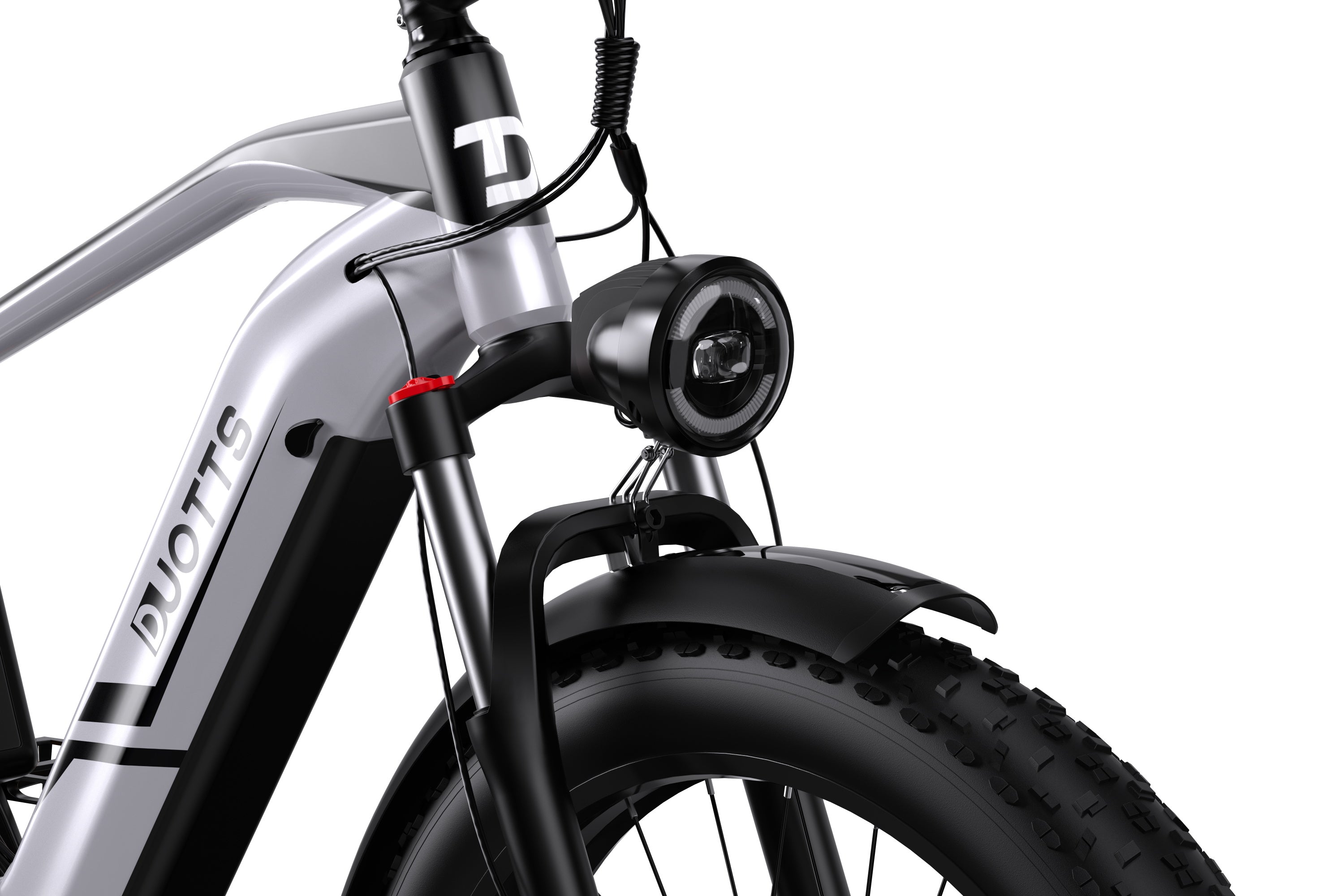 Close-up of the headlight on the Duotts F26 dual motor ebike in silvery white, highlighting its bright LED light.